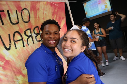 Students with Panther Camp Banner